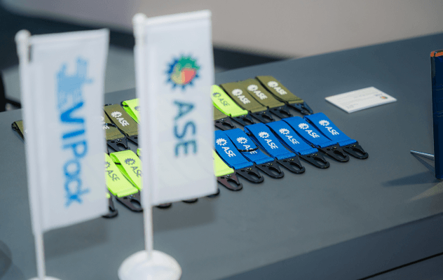 ASE engineers collaborating on advanced semiconductor technology