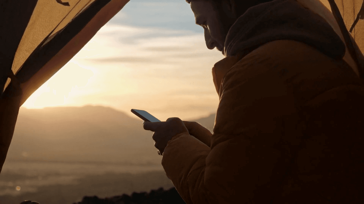 A traveler using satellite communications