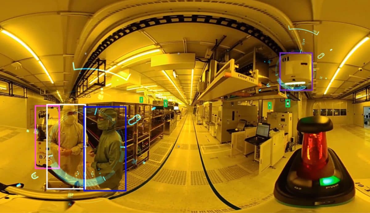 AI vision overlays tracking operators and automated equipment inside an ASE cleanroom