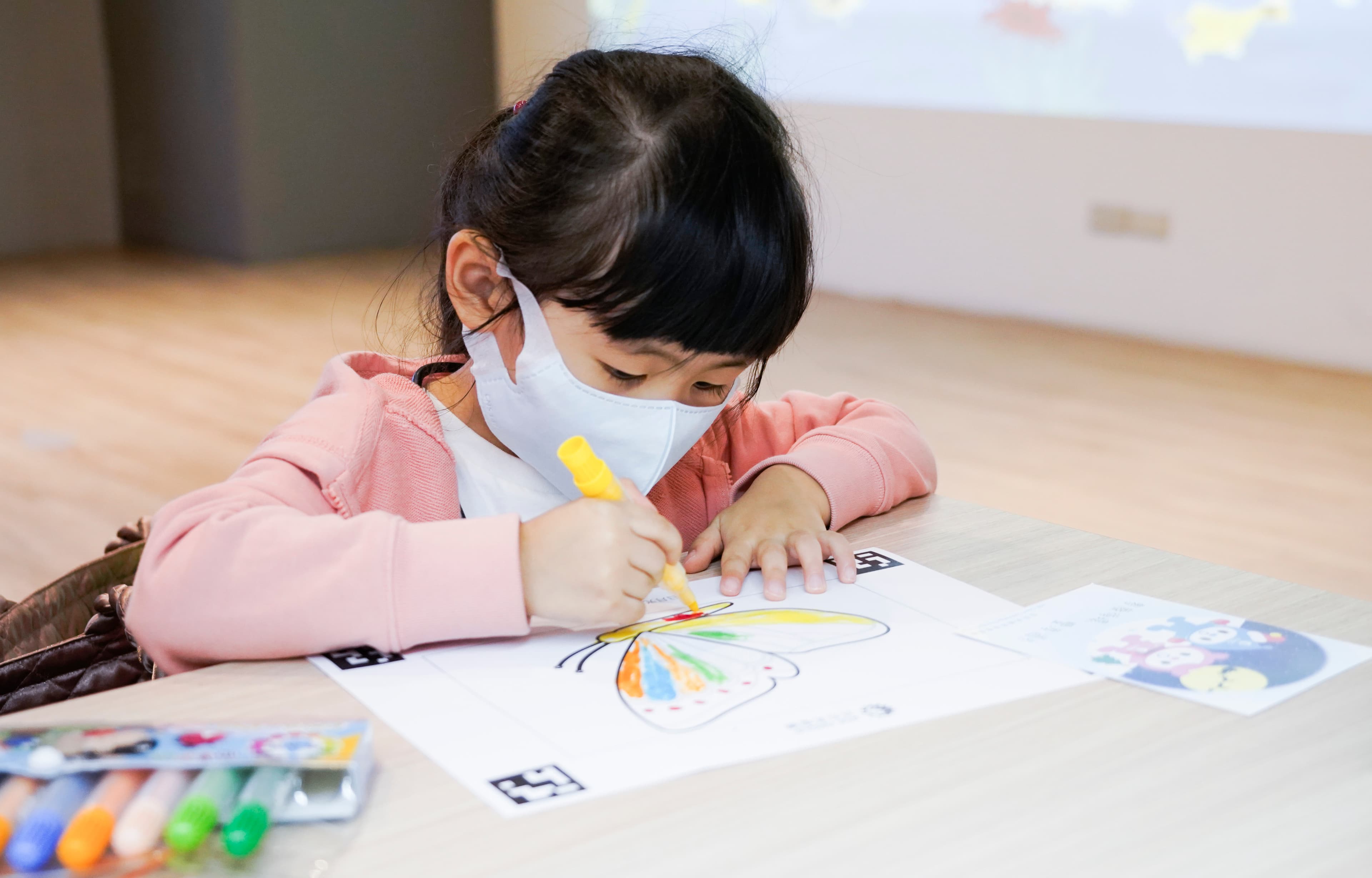 Child learning at an ASE on-site kindergarten